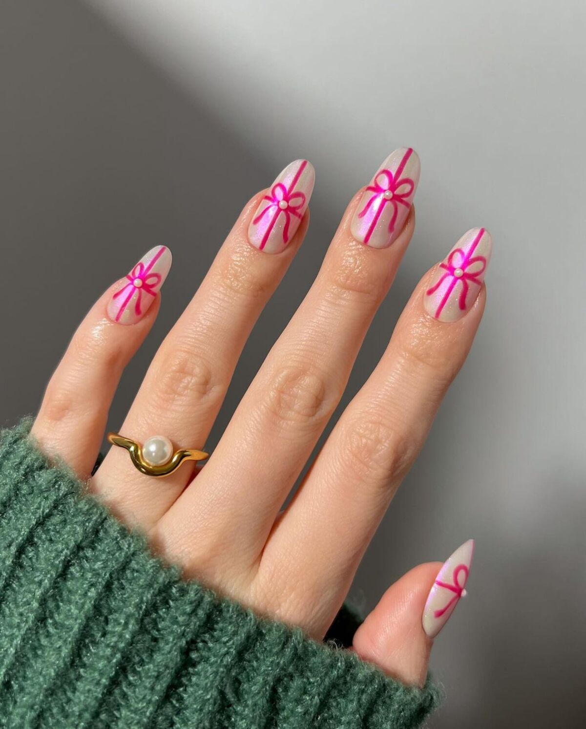 30. Pink Gift Box-Inspired Holiday Nails