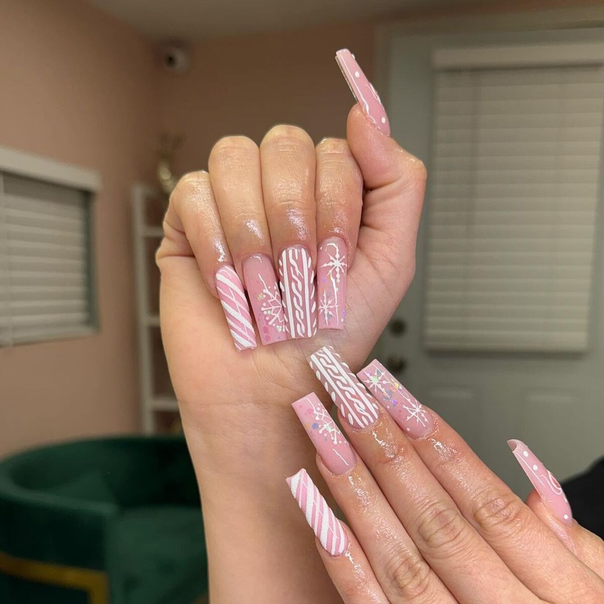 9. Candy Cane-Inspired Pink Christmas Nails