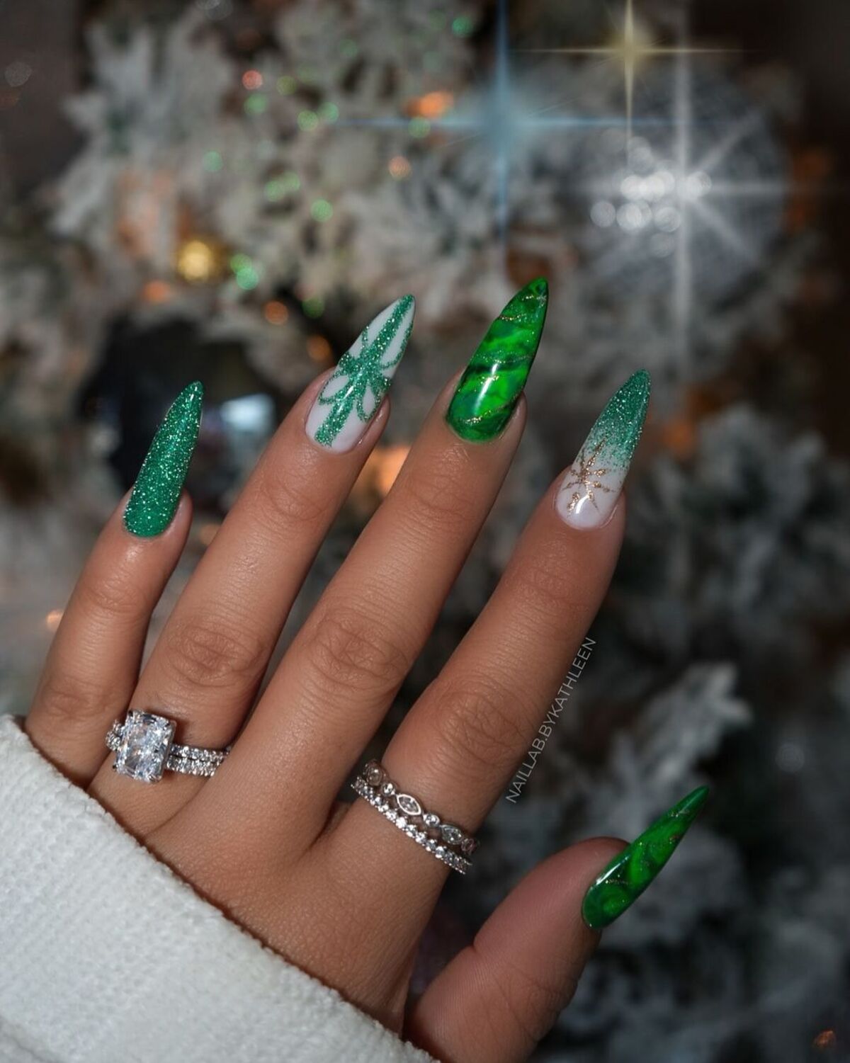 14. Green Marble and Glitter Christmas Nails