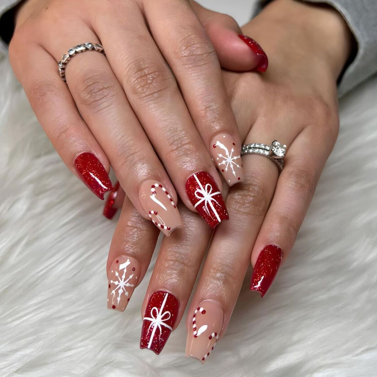 2. Red and Nude Christmas Present Nails