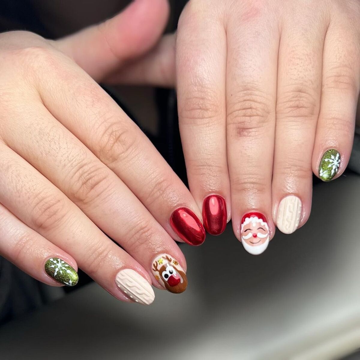 1. Festive Santa and Reindeer Nails with Cozy Sweater Texture