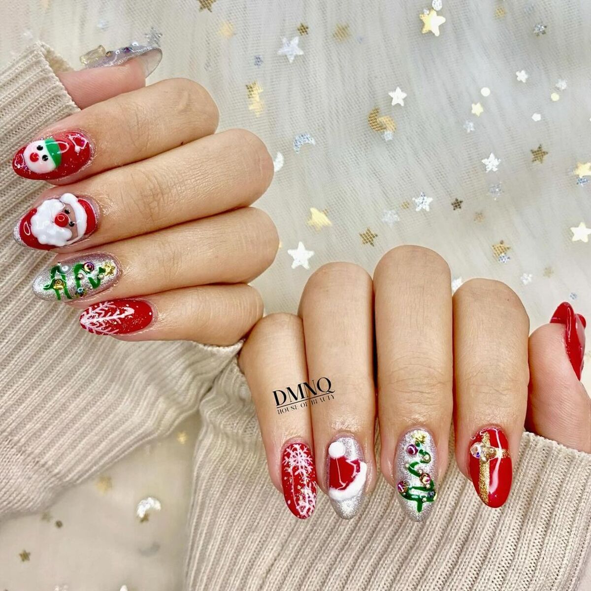 15. Glittery Red Nails with Santa Hat and Christmas Tree Accents