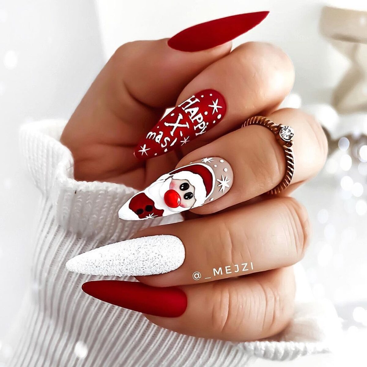 16. Red and White Santa-Themed Stiletto Nails