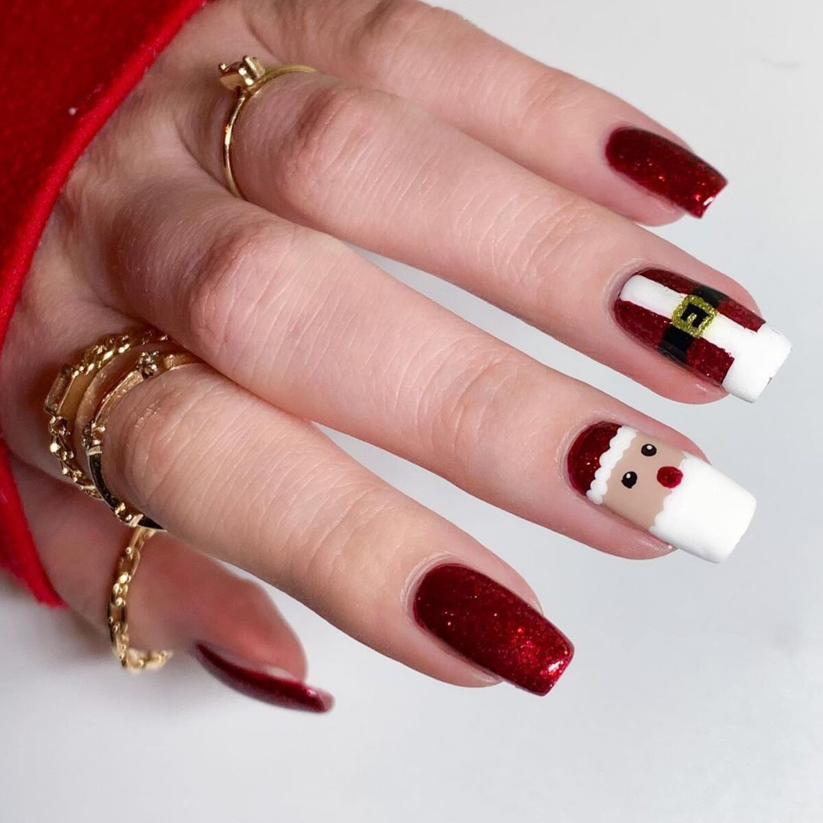 2. Bold Red Santa Suit Nails with Sparkling Glitter