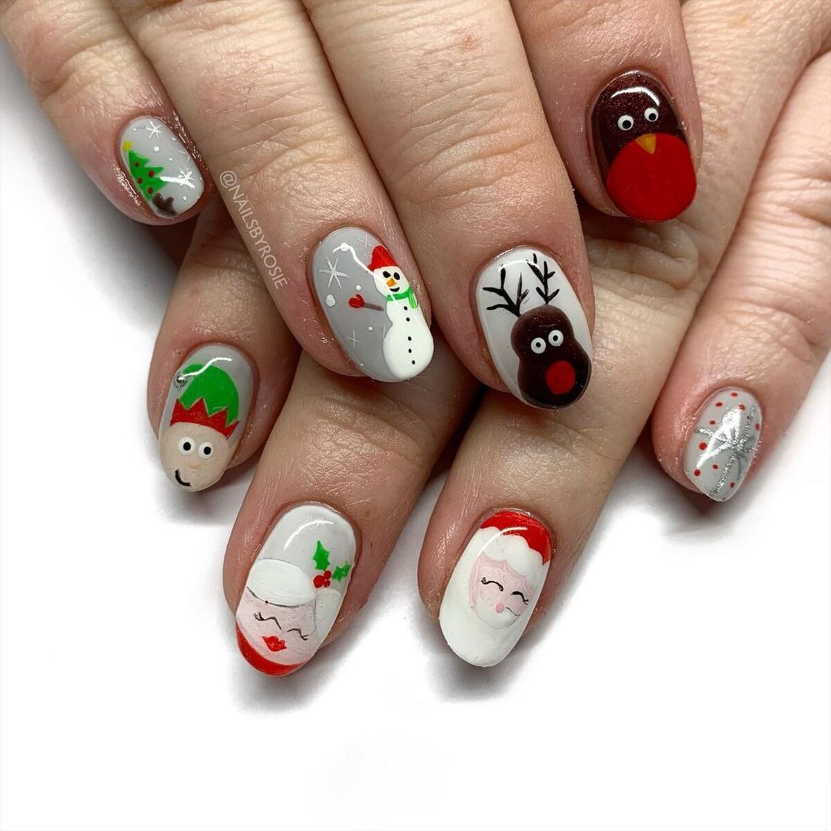 5. Adorable Cartoon Christmas Characters Nail Art