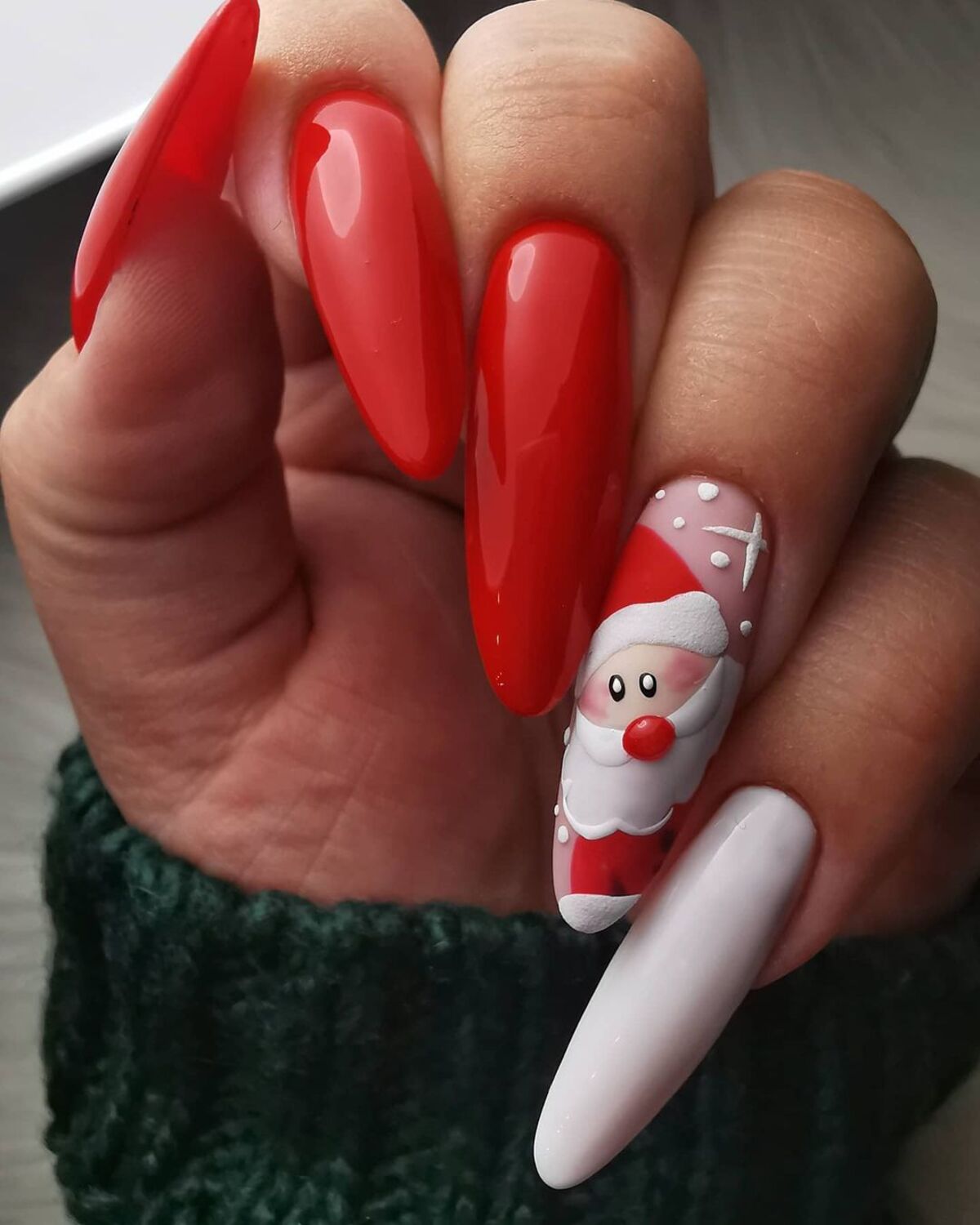 6. Classic Red and White Santa Nails with a Touch of Sparkle