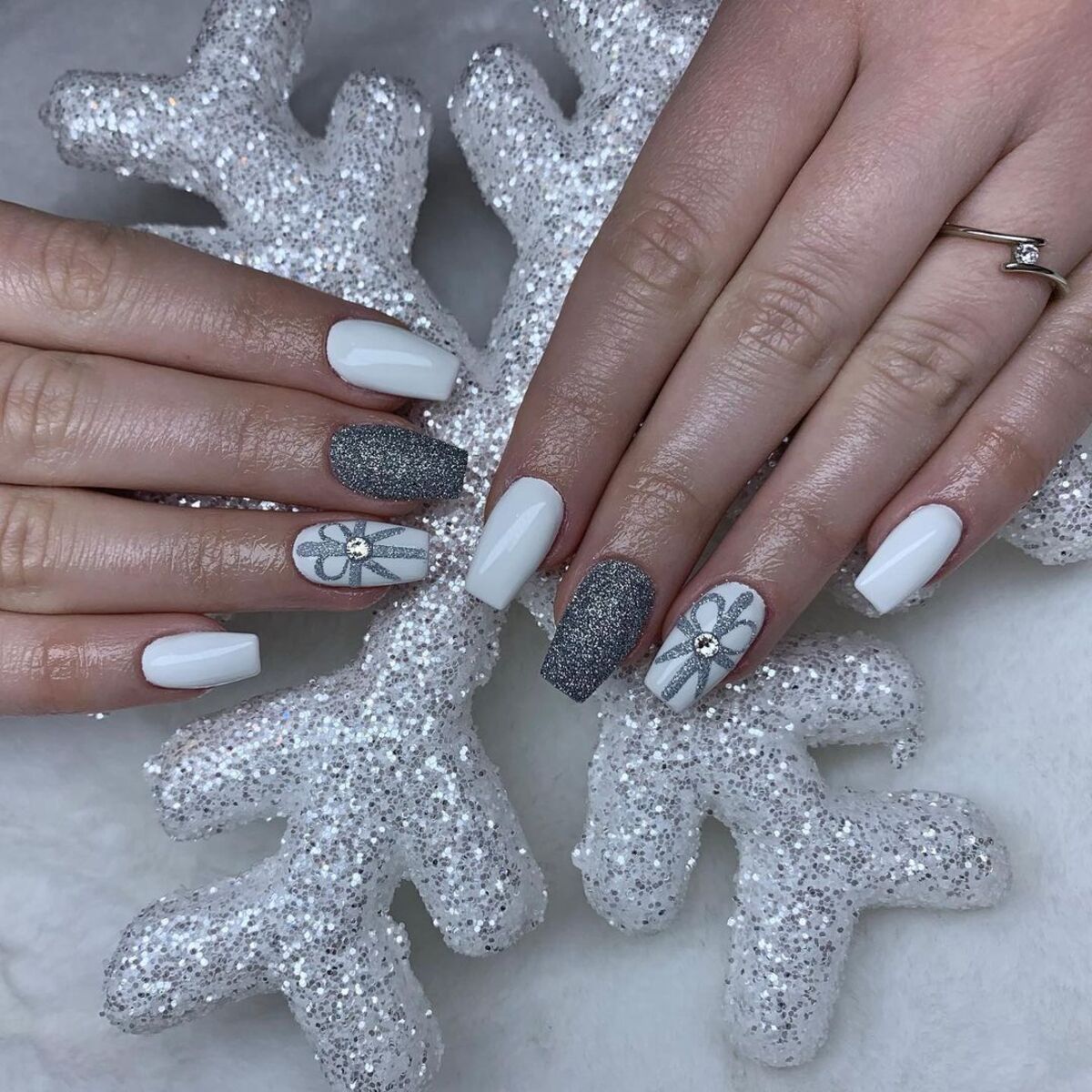 19. Classic White and Silver Gift-Wrapped Nails