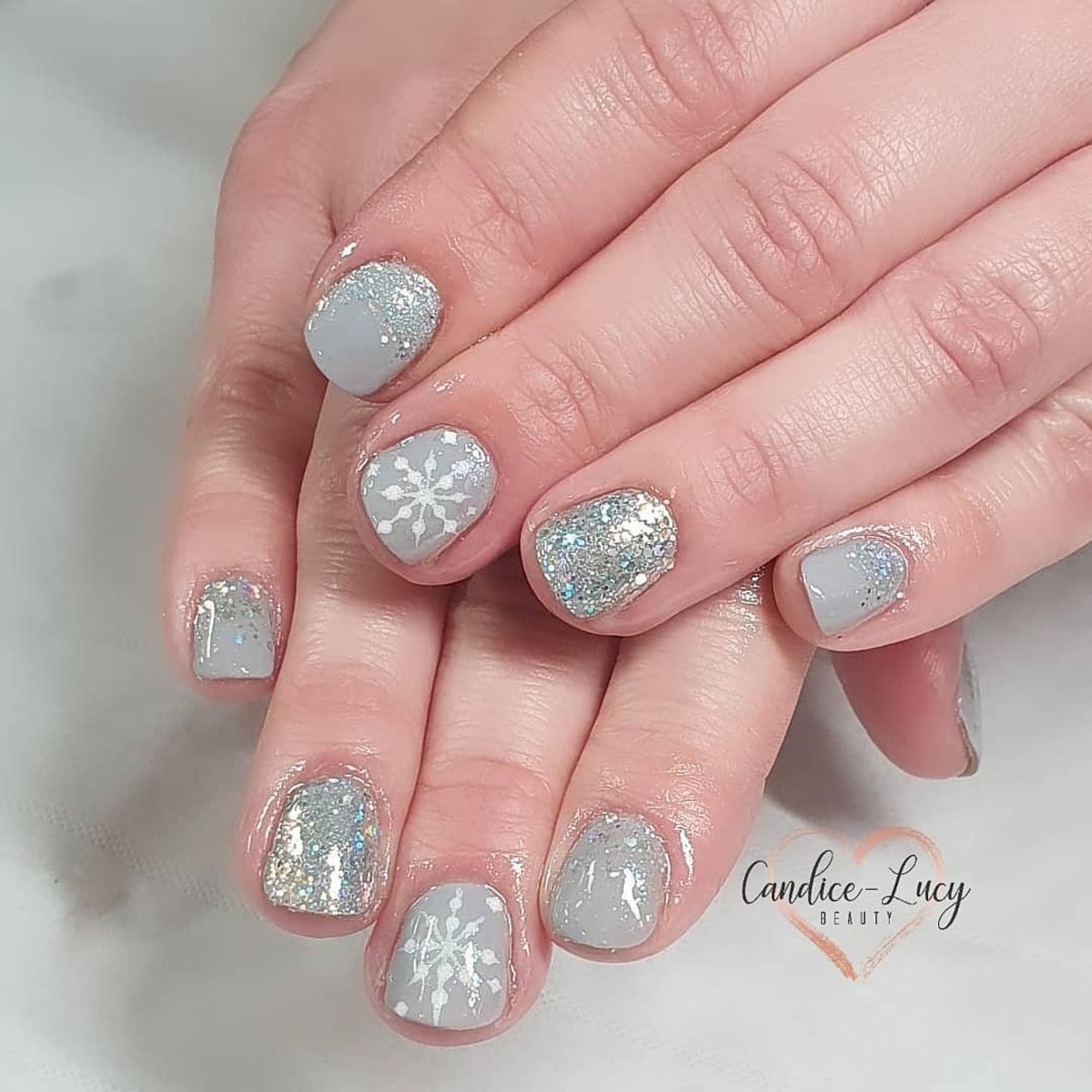 30. Icy Blue Snowflakes with Glitter Accents