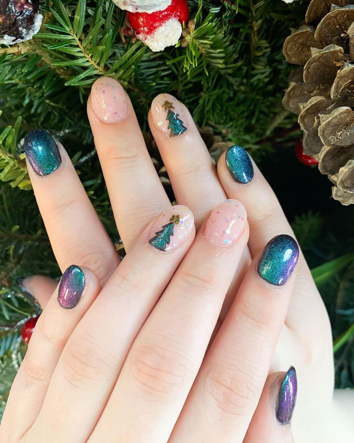 20. Holographic Christmas Trees on Iridescent Nails