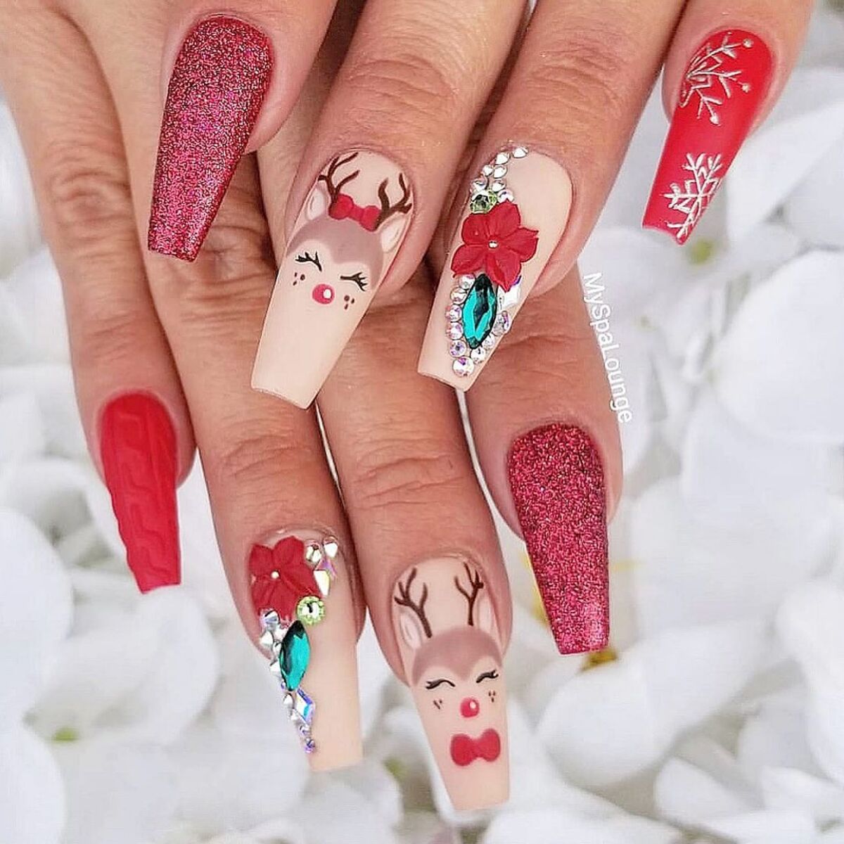 15. Glamorous Red Glitter and Rhinestone Reindeer Nails