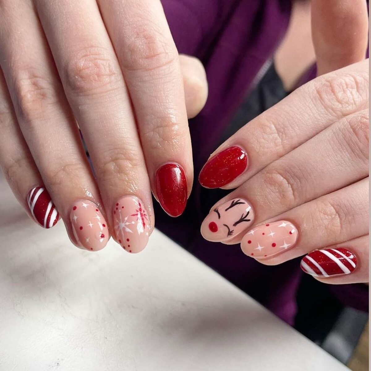 2. Candy Cane and Reindeer Christmas Nails