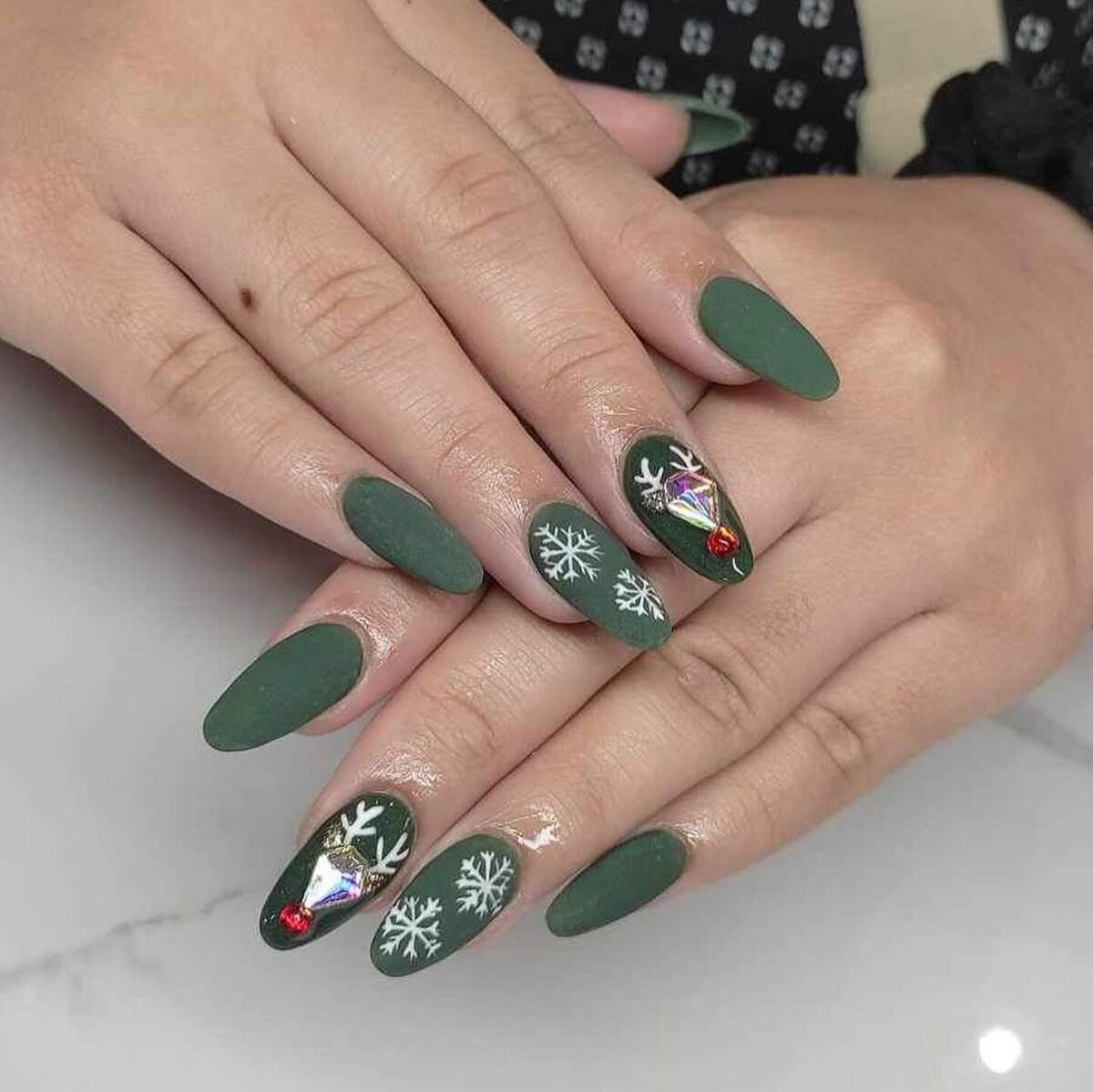 20. Forest Green and Snowflake Reindeer Nails