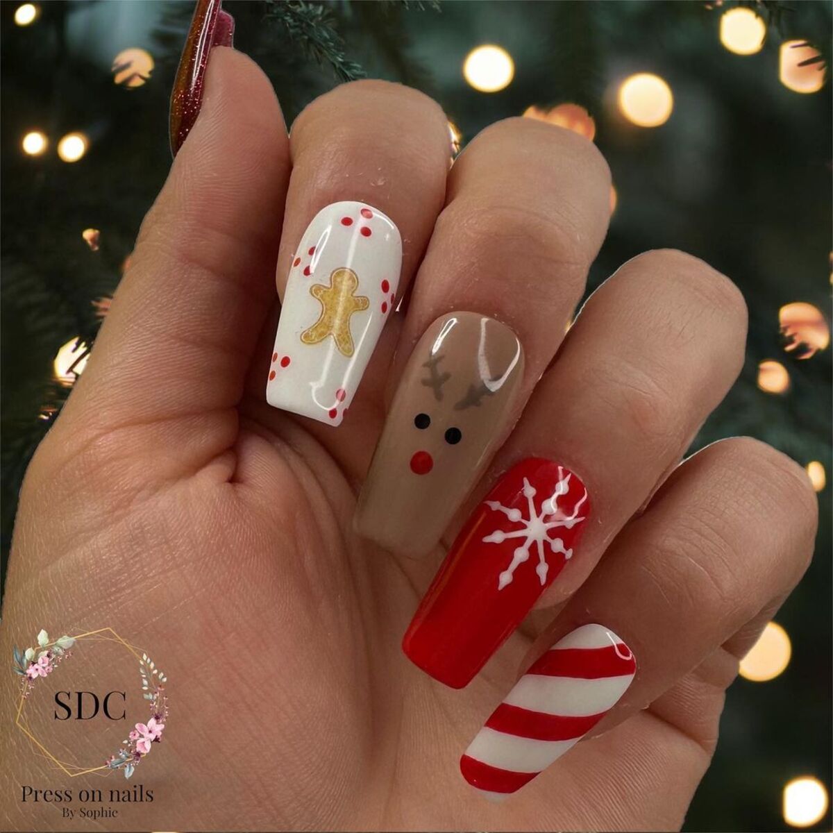 4. Whimsical Gingerbread and Reindeer Nails