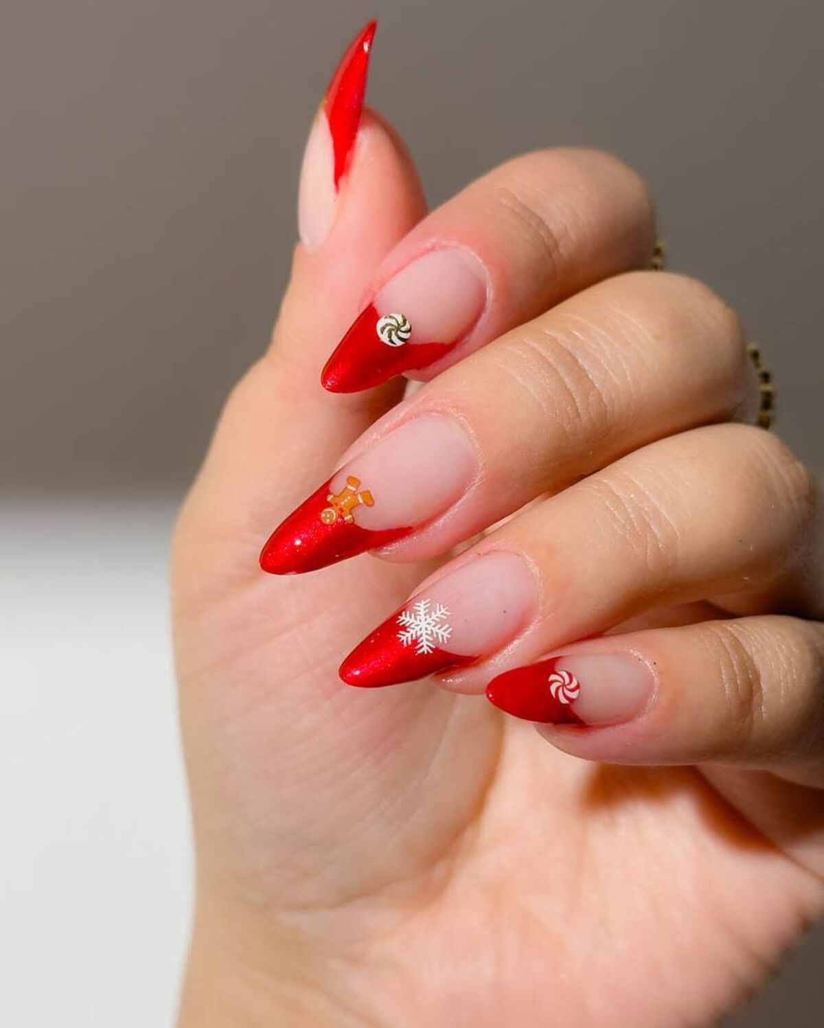 27. Classic Red French Tips with Holiday Stickers