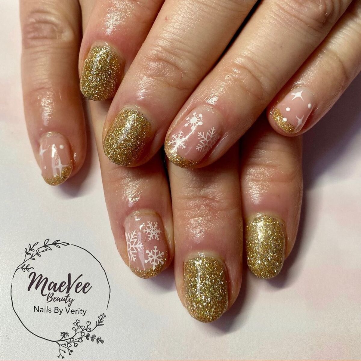 21. Gold Glitter with Delicate Snowflake Art