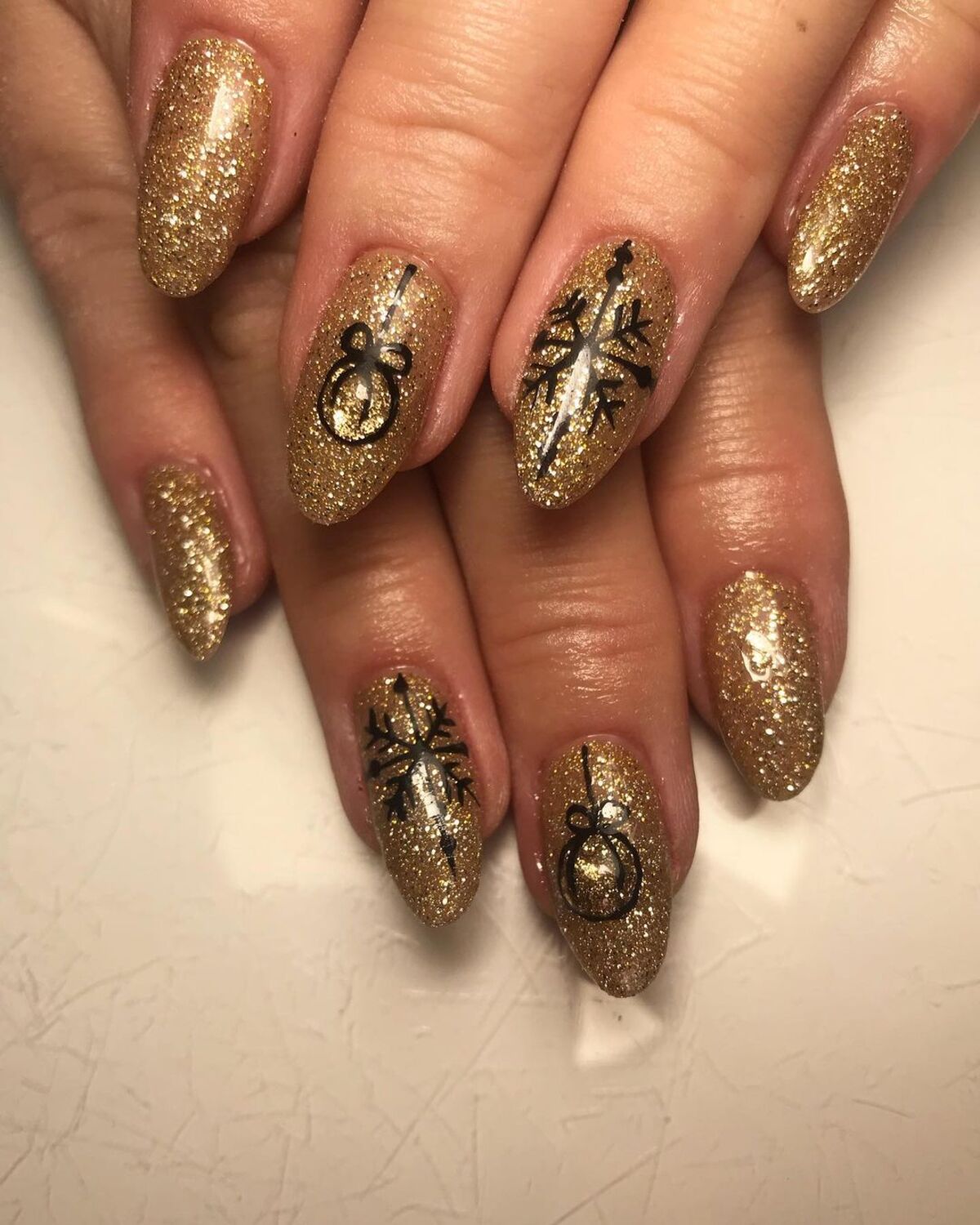 31. Elegant Snowflakes and Gold Embellishments