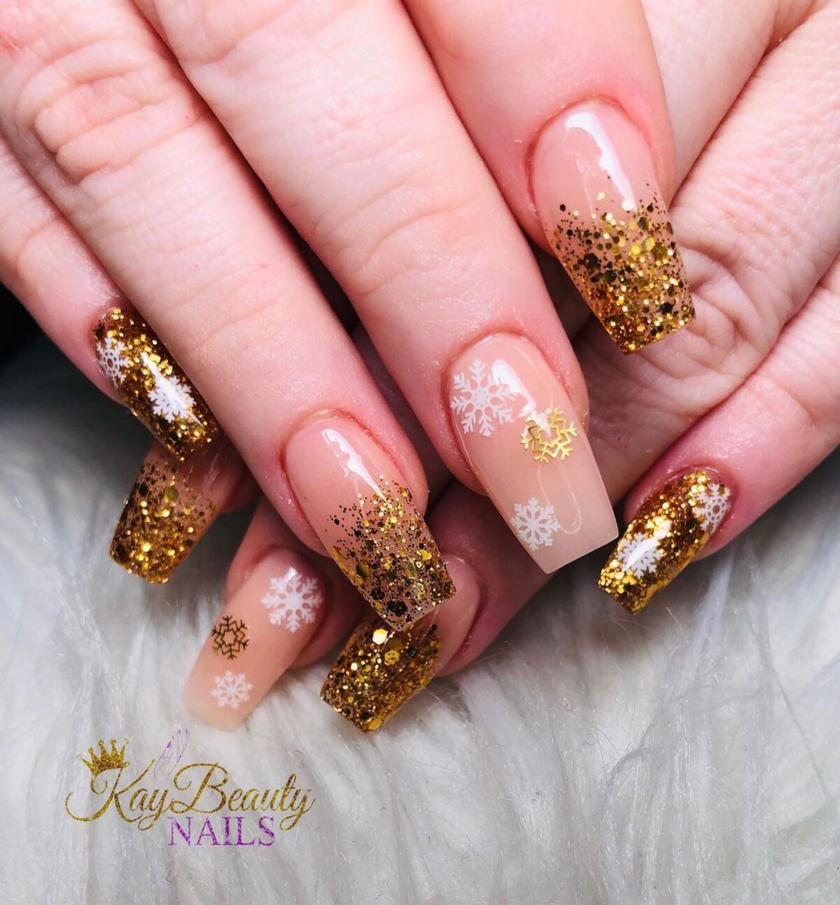 5. Golden Glitter with White Snowflakes