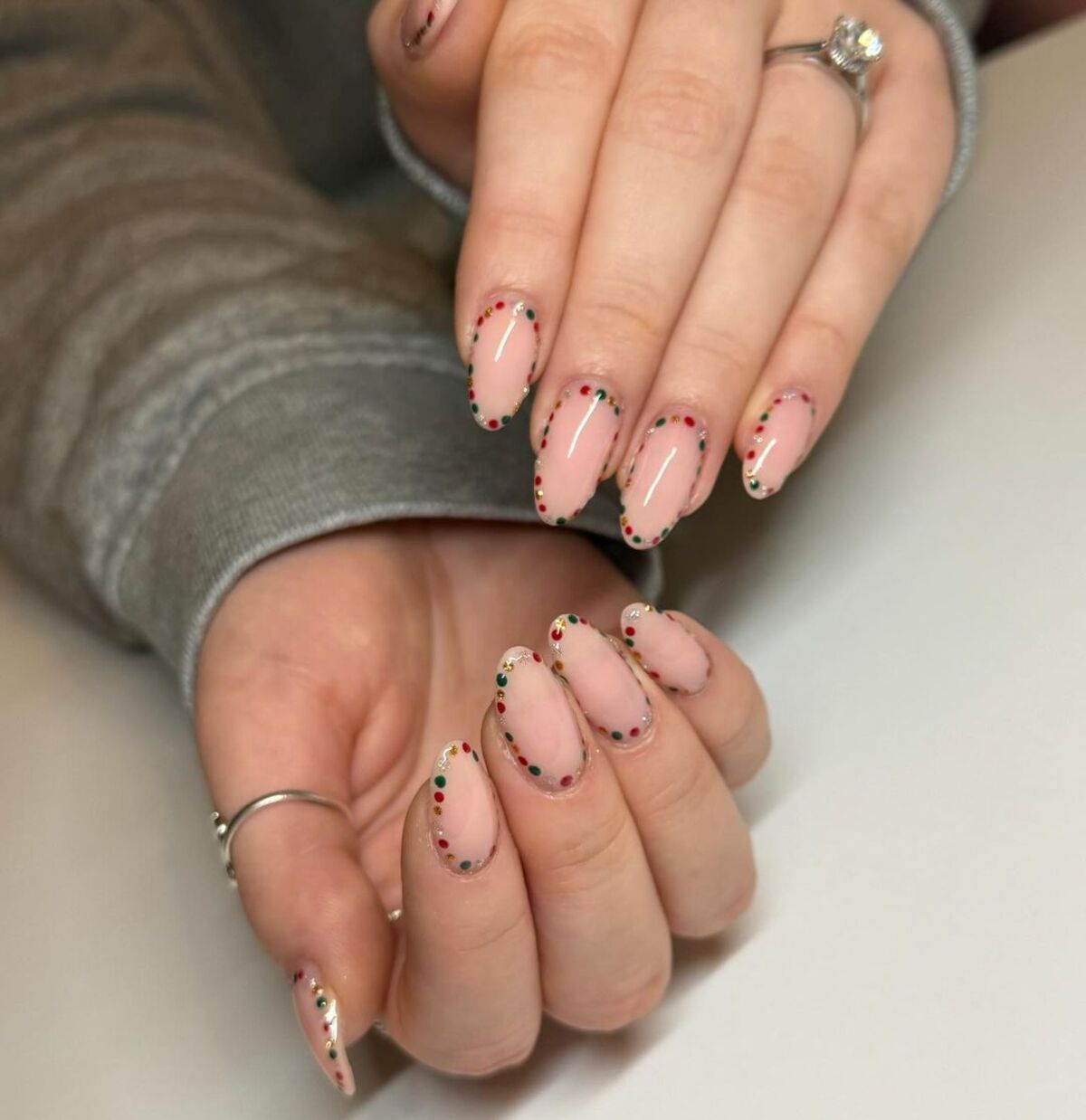 3. Minimalist Holiday Dotted French Manicure