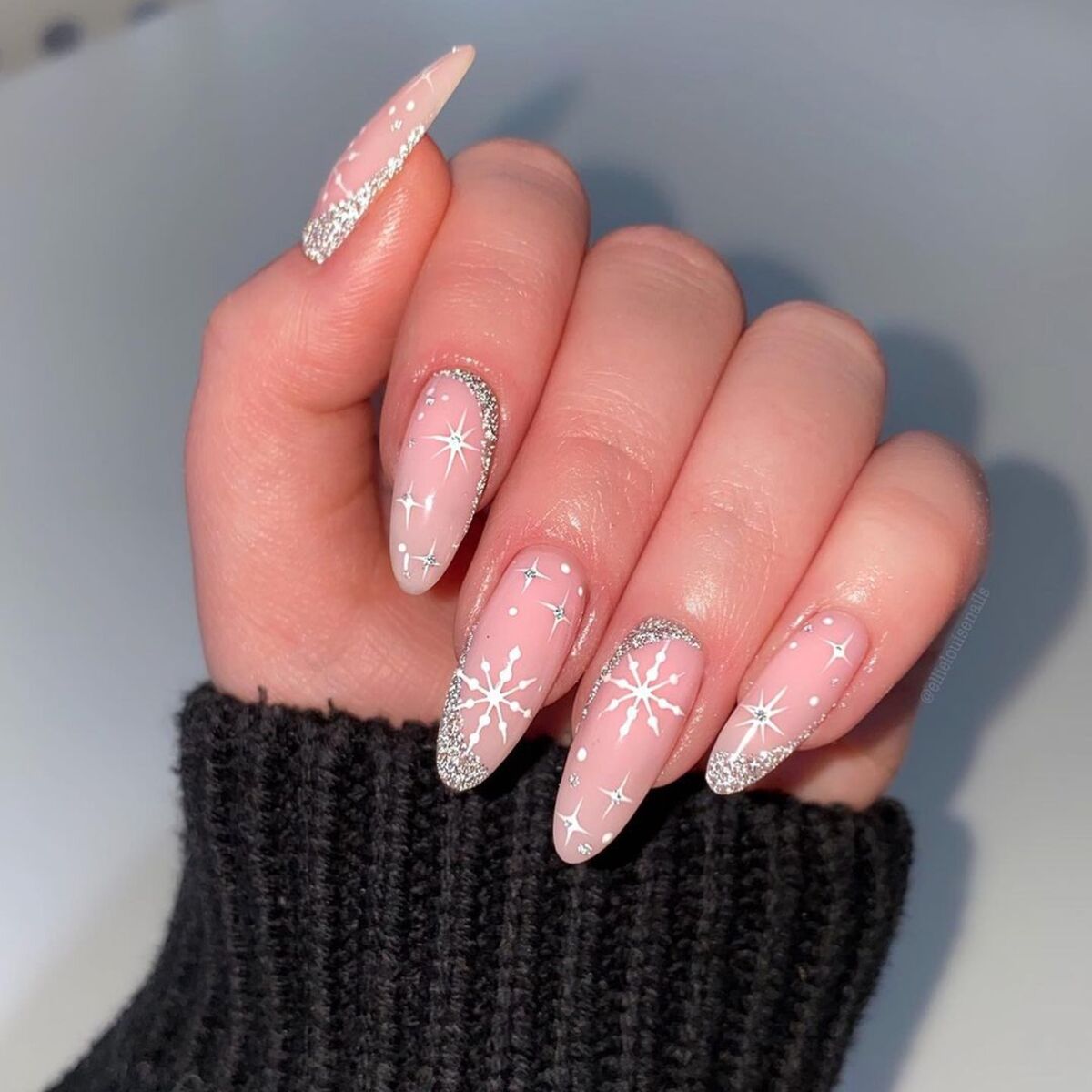 8. Sparkling Snowflakes with Glitter-Tipped Nails