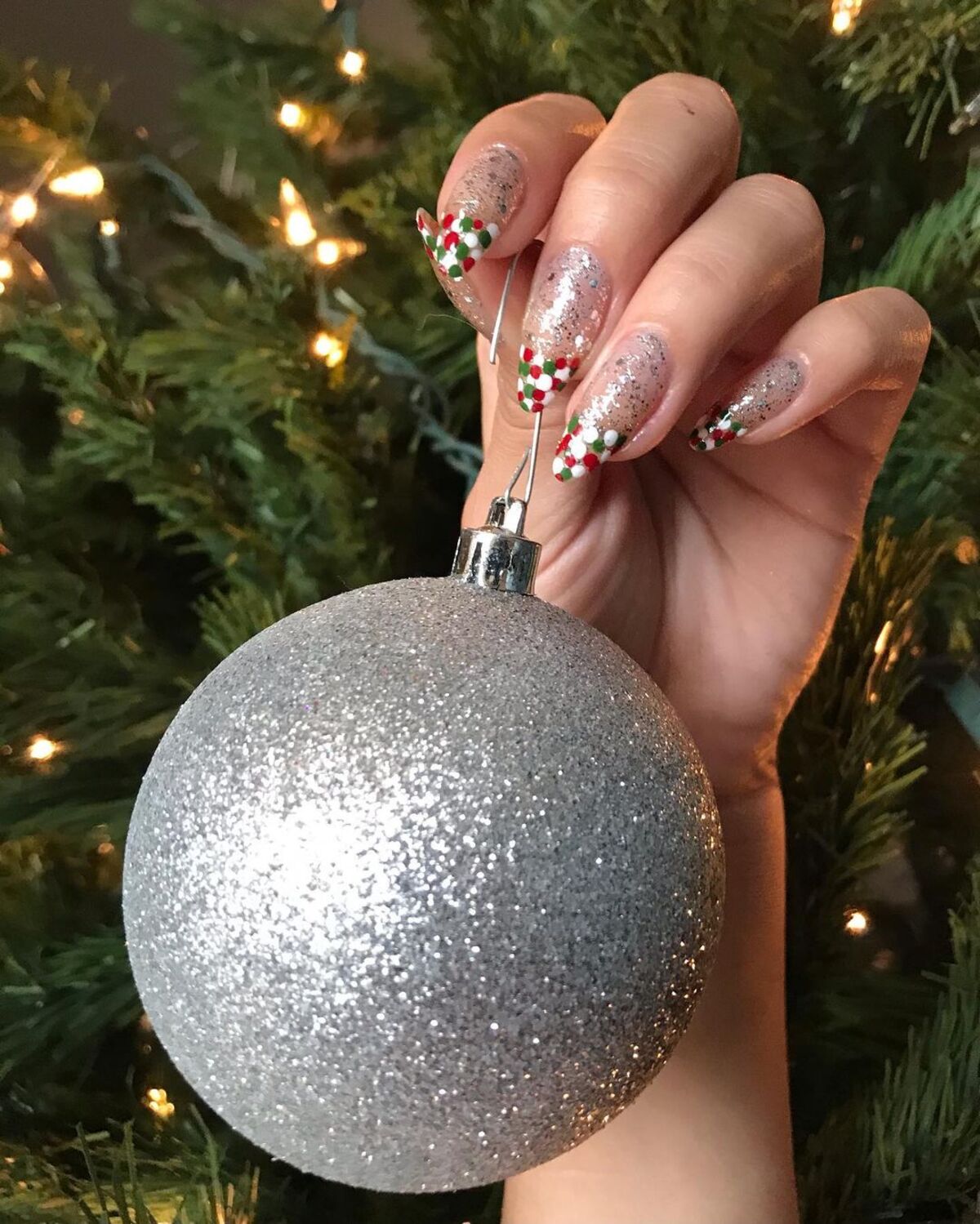 16. Glitter French Tips with Christmas Dots