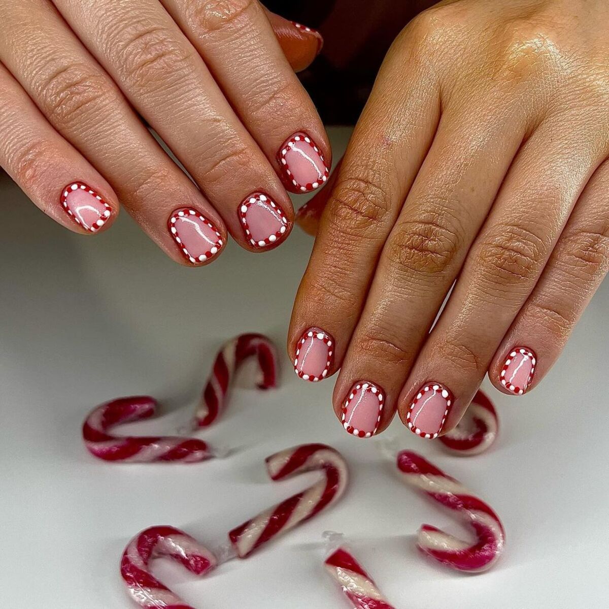 8. Peppermint Candy-Inspired Dotted Nails