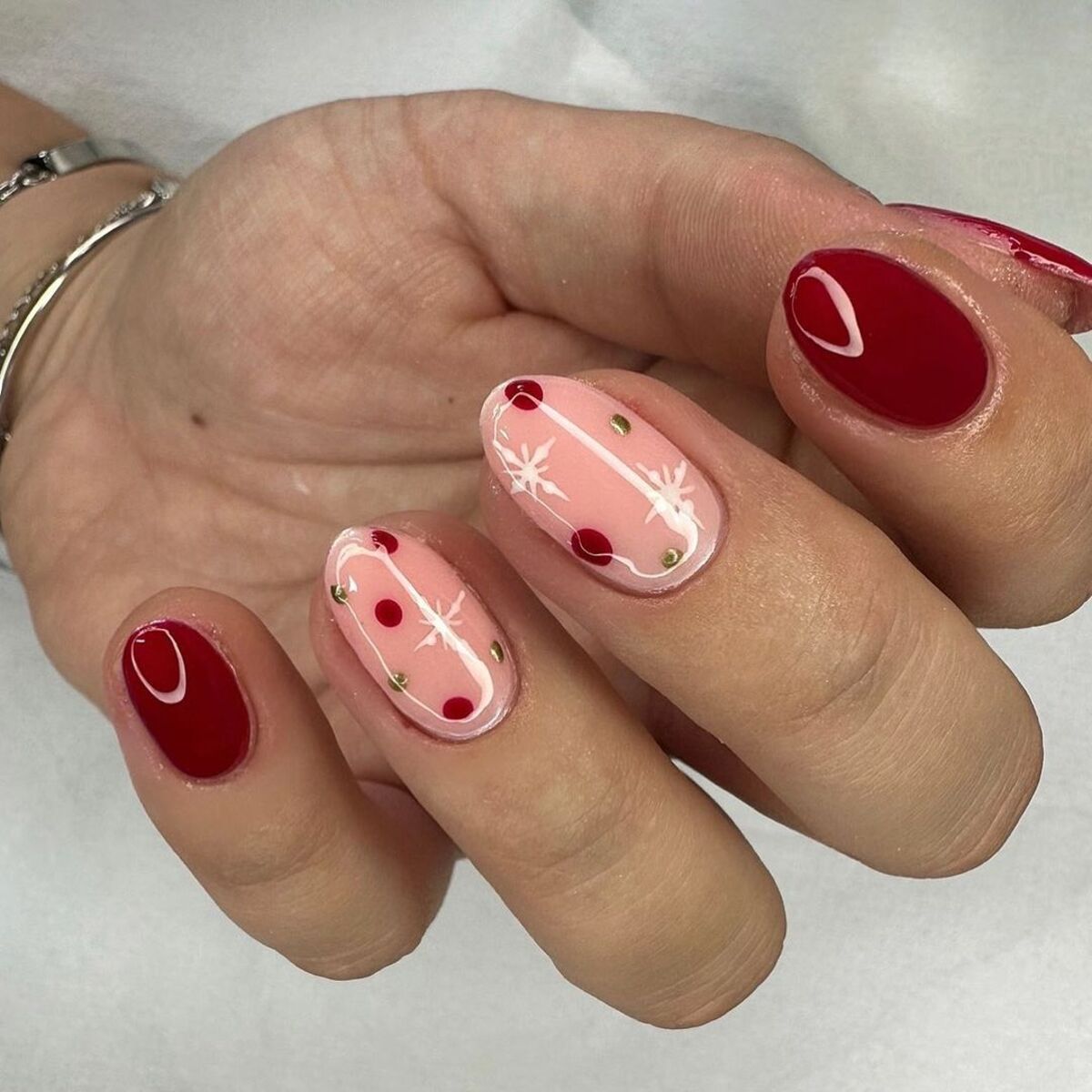 9. Modern Red and Gold Christmas Nail Art