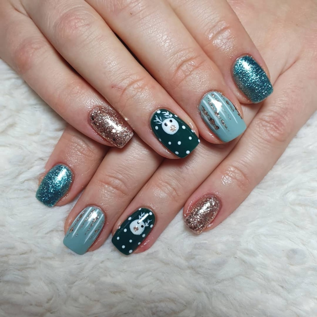 18. Frosty Reindeer and Glittery Teal Accents