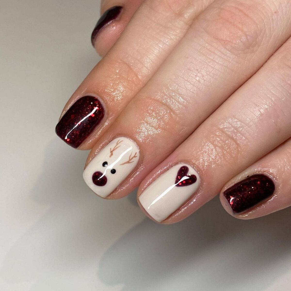 2. Rudolph and Hearts Holiday Nail Art