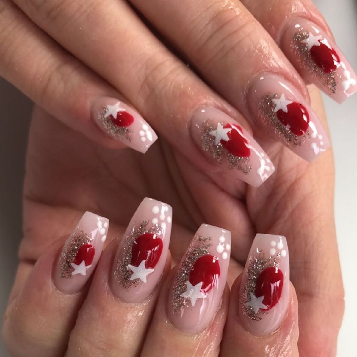 3. Red Stars and Snowflakes on Nude Gel