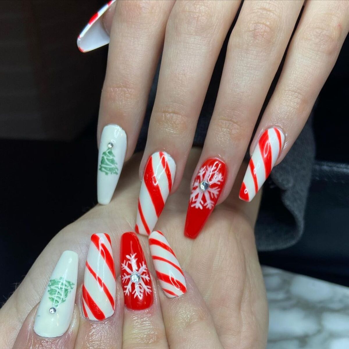 13. Red and White Candy Cane Stripes with Christmas Tree Accents