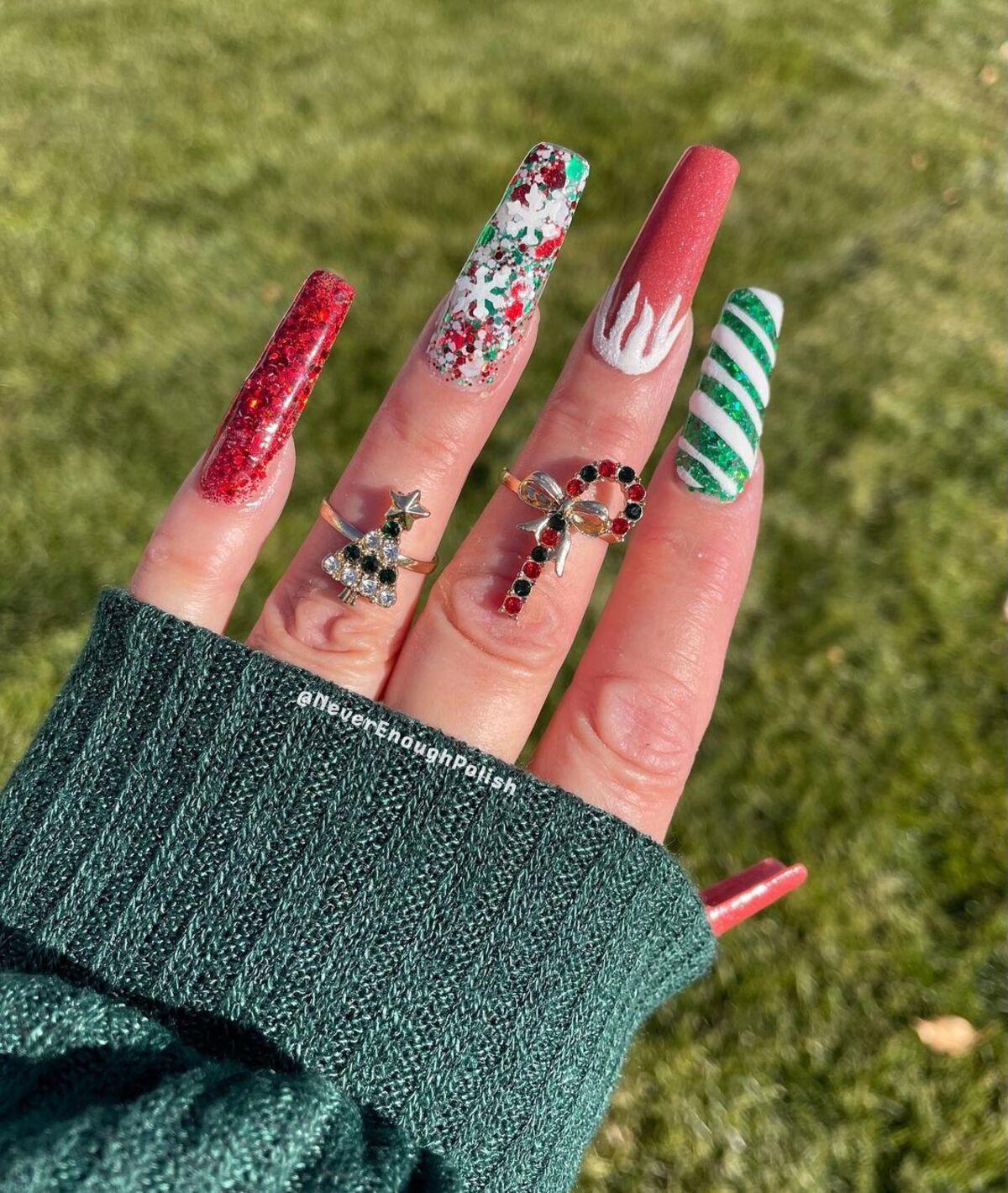 17. Festive Red and Green Nails with Holiday Charms