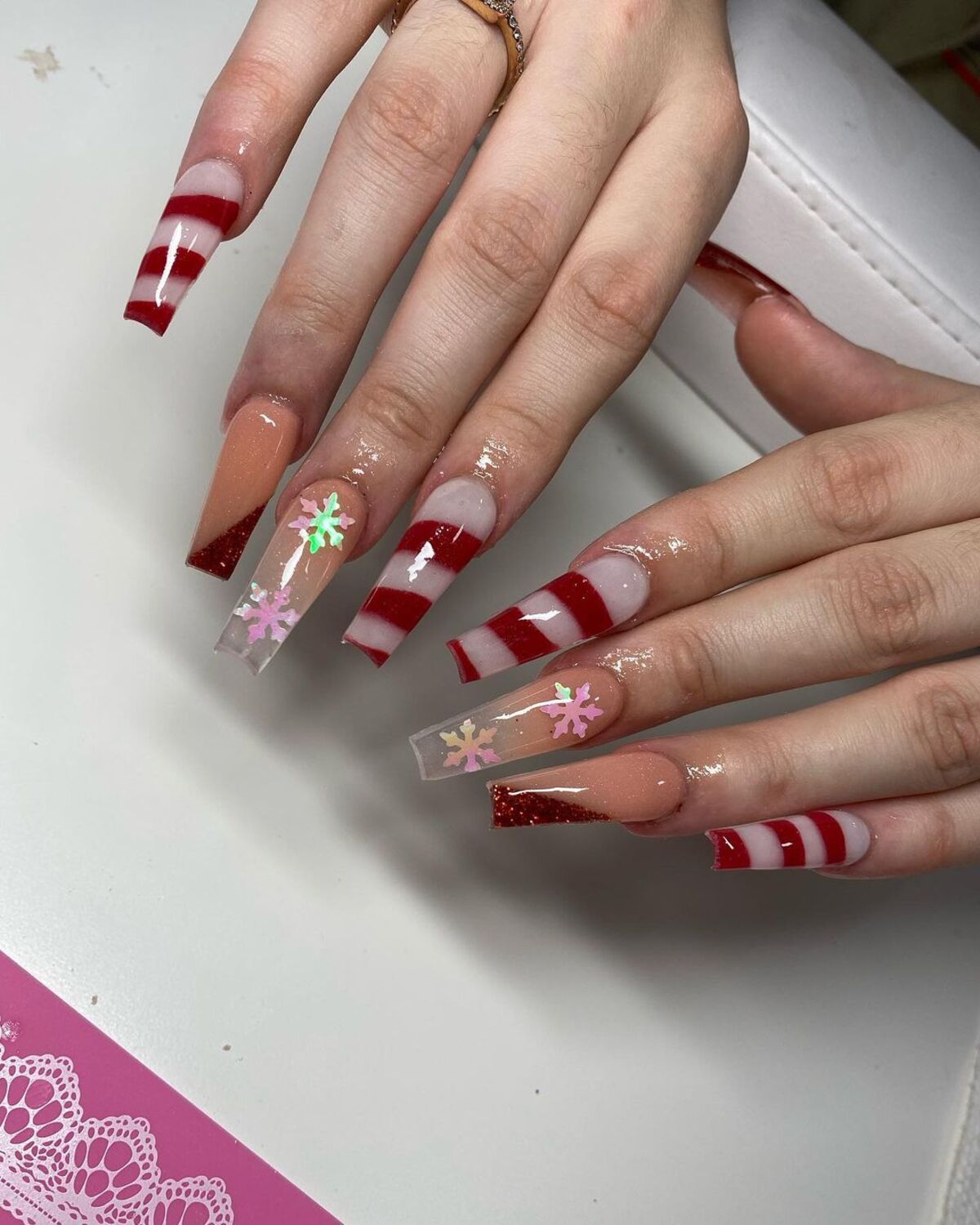 15. Transparent Candy Cane Tips with Snowflakes