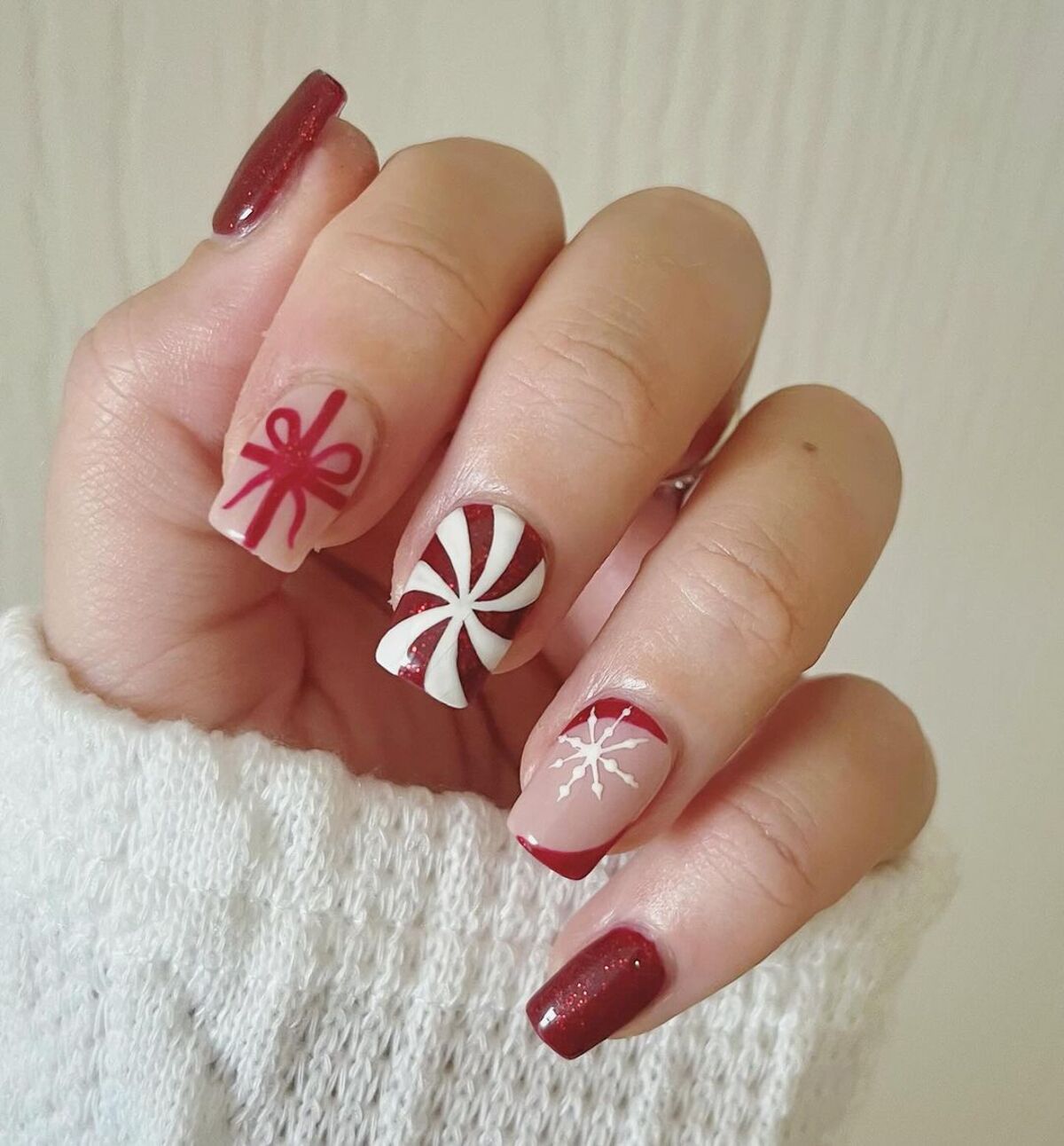 17. Gift-Wrapped Peppermint Nail Art