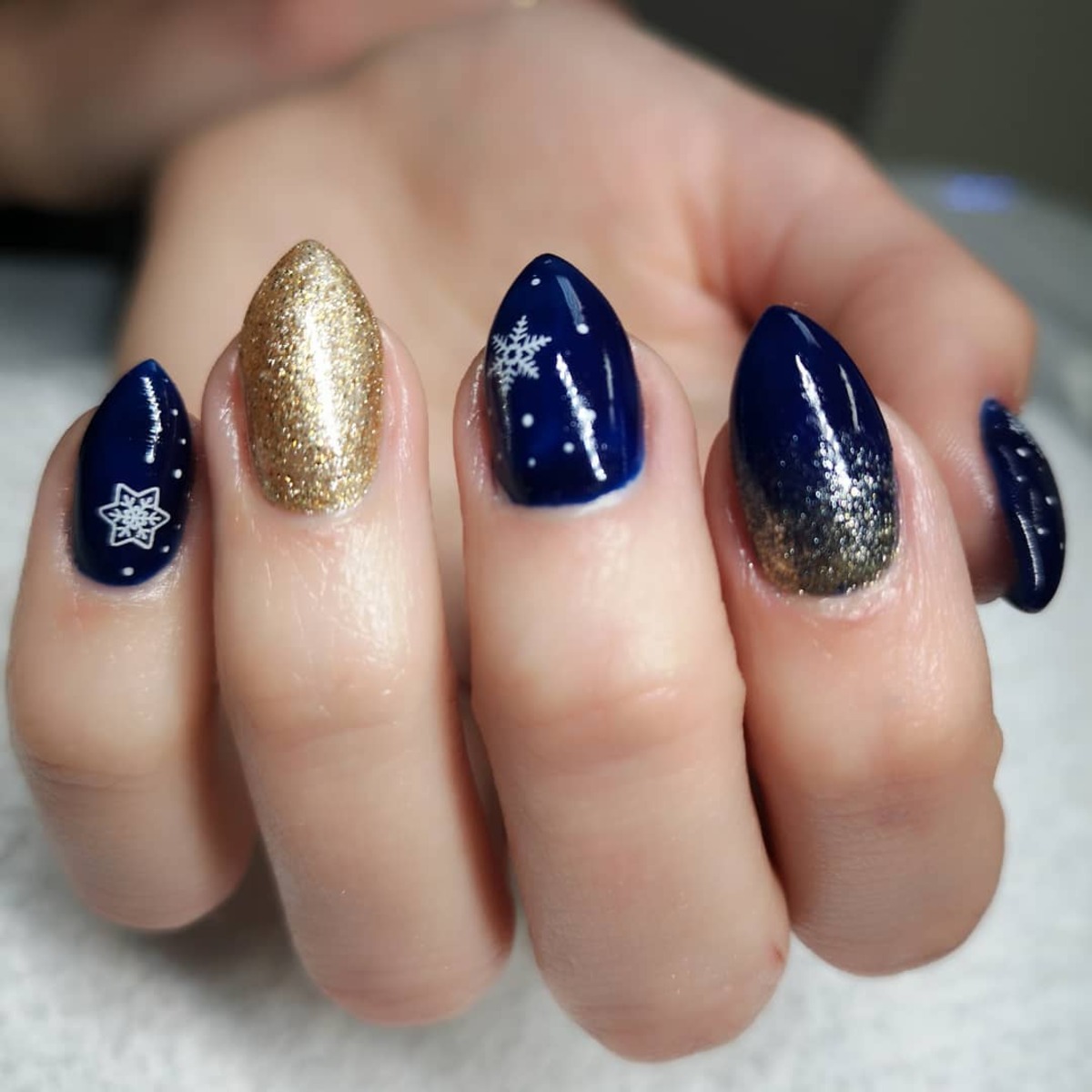 15. Midnight and Gold with Snowflake Accents