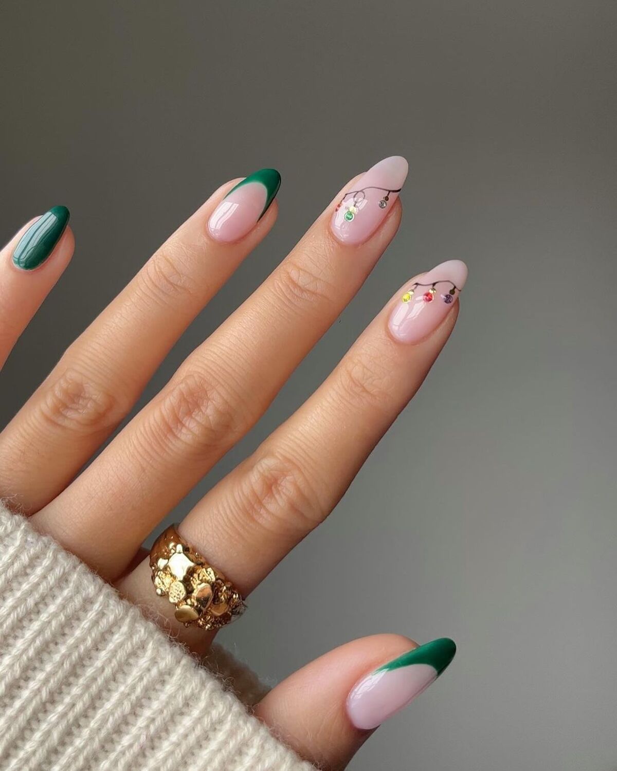 14. Evergreen French Tips with Festive Gem Garland