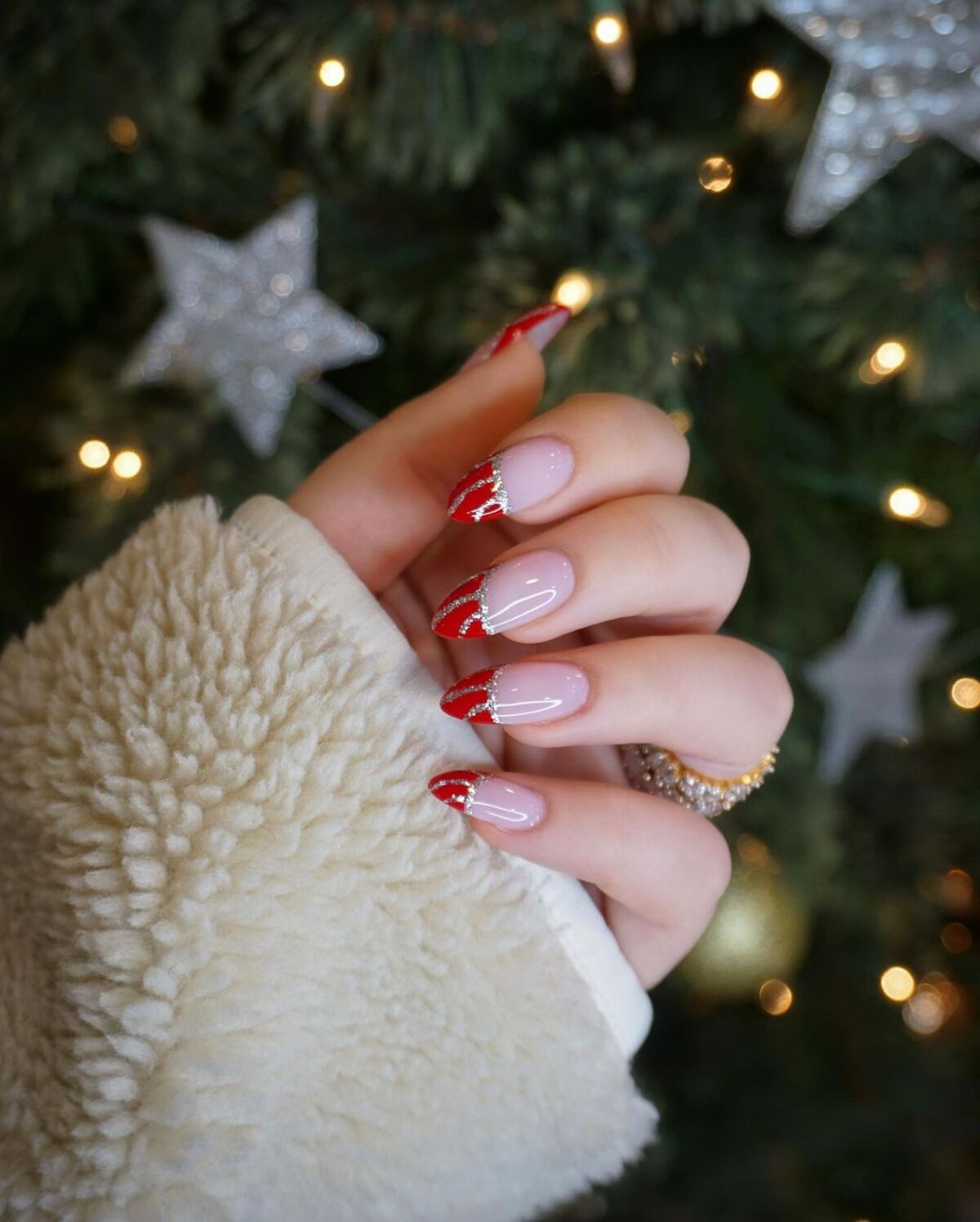 16. Bold Red Glitter French Tips for Festive Glam