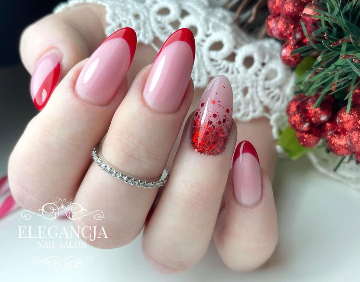 18. Vivid Red French Tips with Glitter Accent