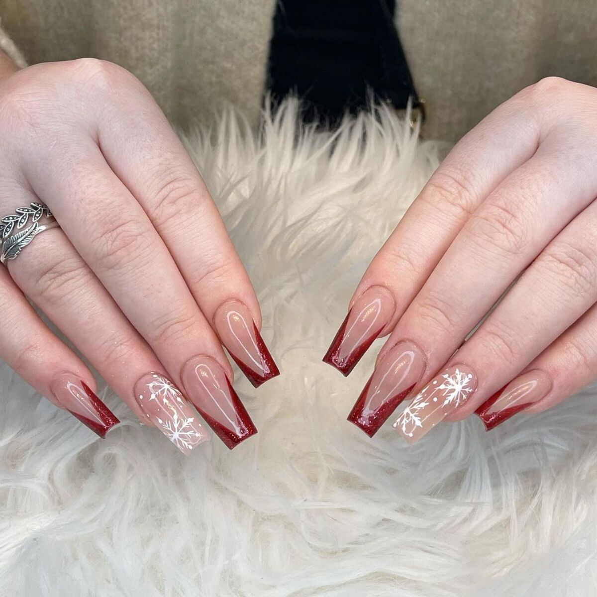 22. Bold Red Square Tips with Snowflake Accents