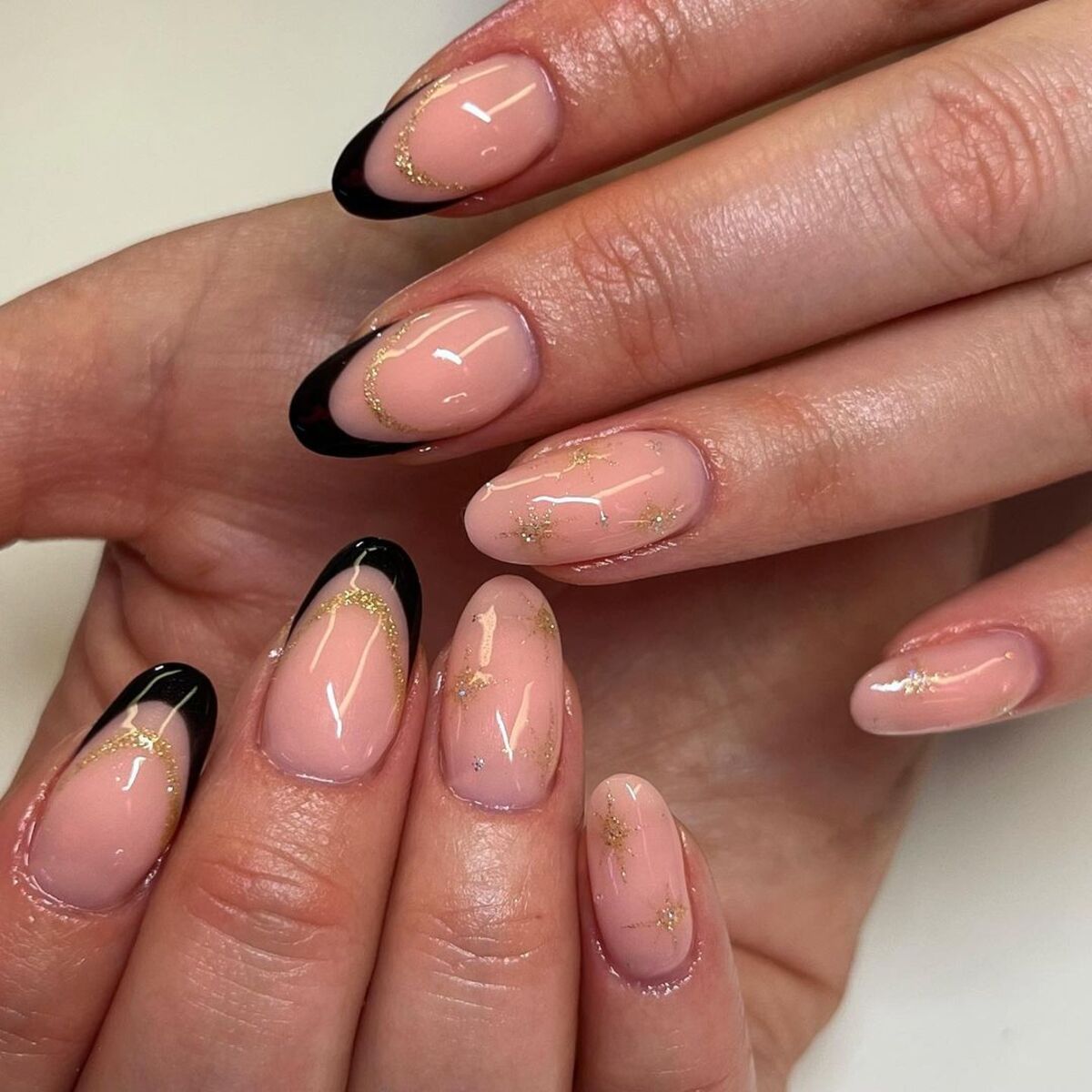 24. Black and Gold Crescent French Tips