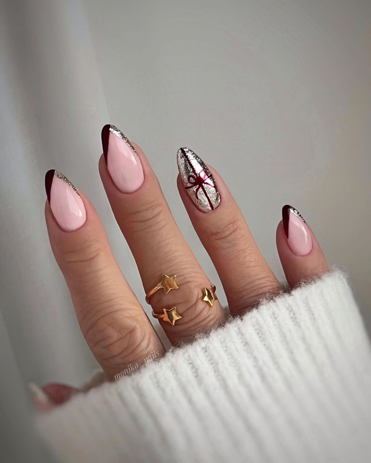 8. Metallic Holiday French Tips with Present Accent Nail