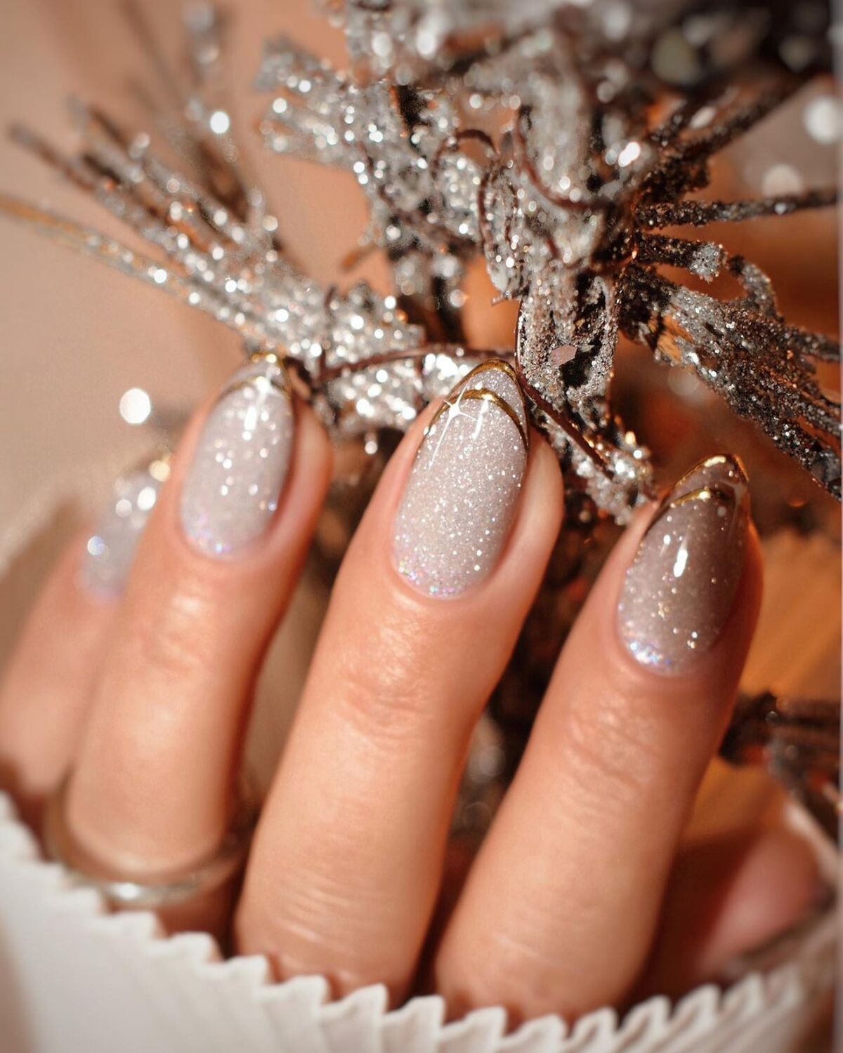 1. Glittering Silver Glam with Golden Tips