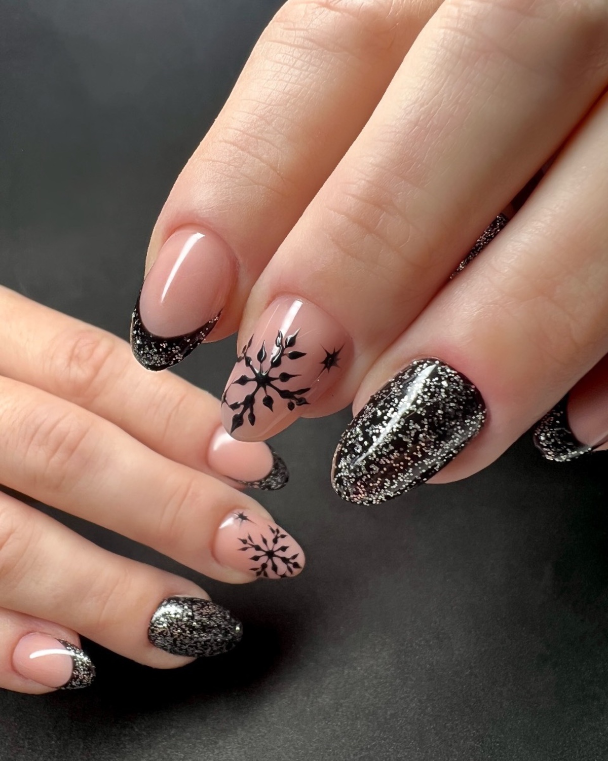 16. Black and Glittered Snowflakes