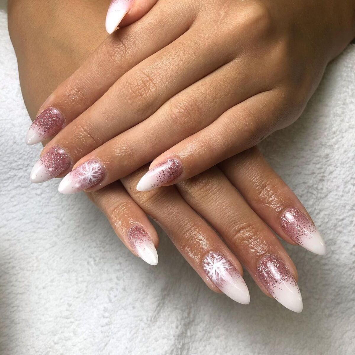 4. Soft Pink and White Gradient with Snowflake Accents