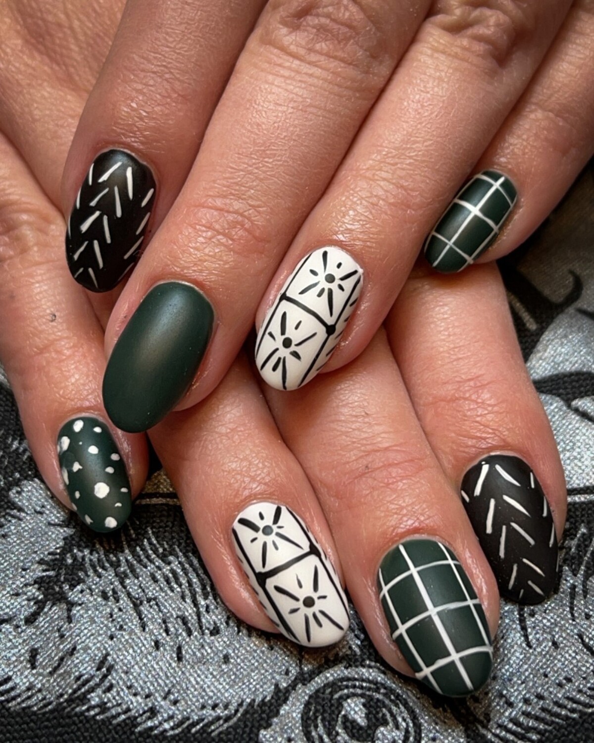 23. Forest Green and White Geometric Patterns