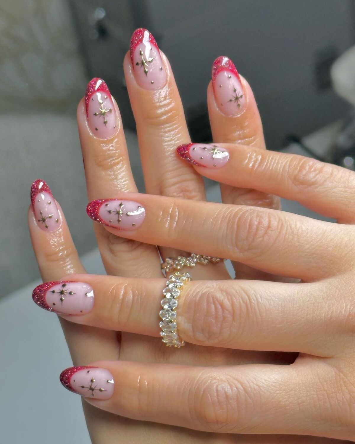 2. Glittery Red Tips with Star Details