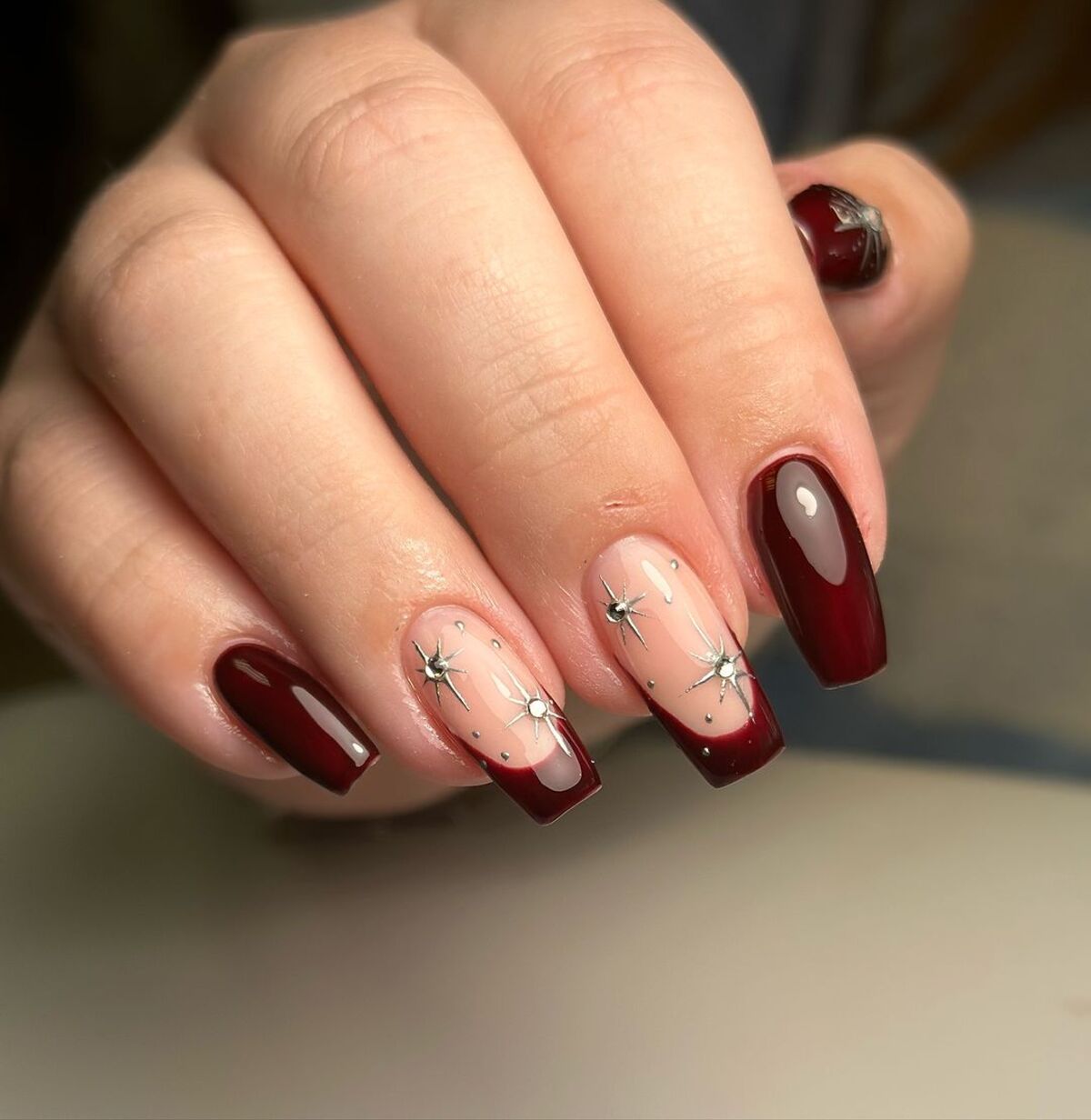 4. Deep Burgundy with Delicate Star Accents