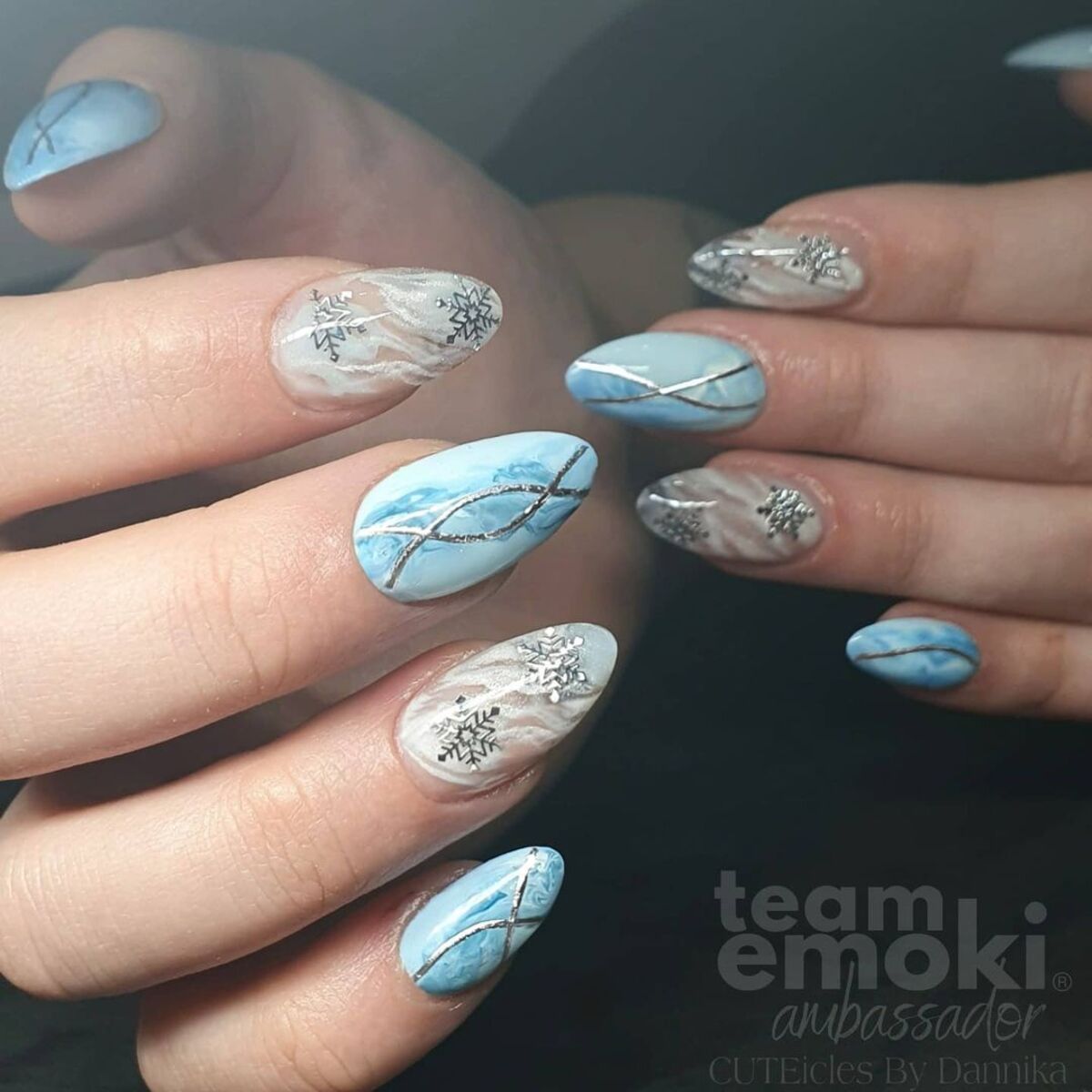 17. Icy Blue Marble with Snowflake and Silver Accents