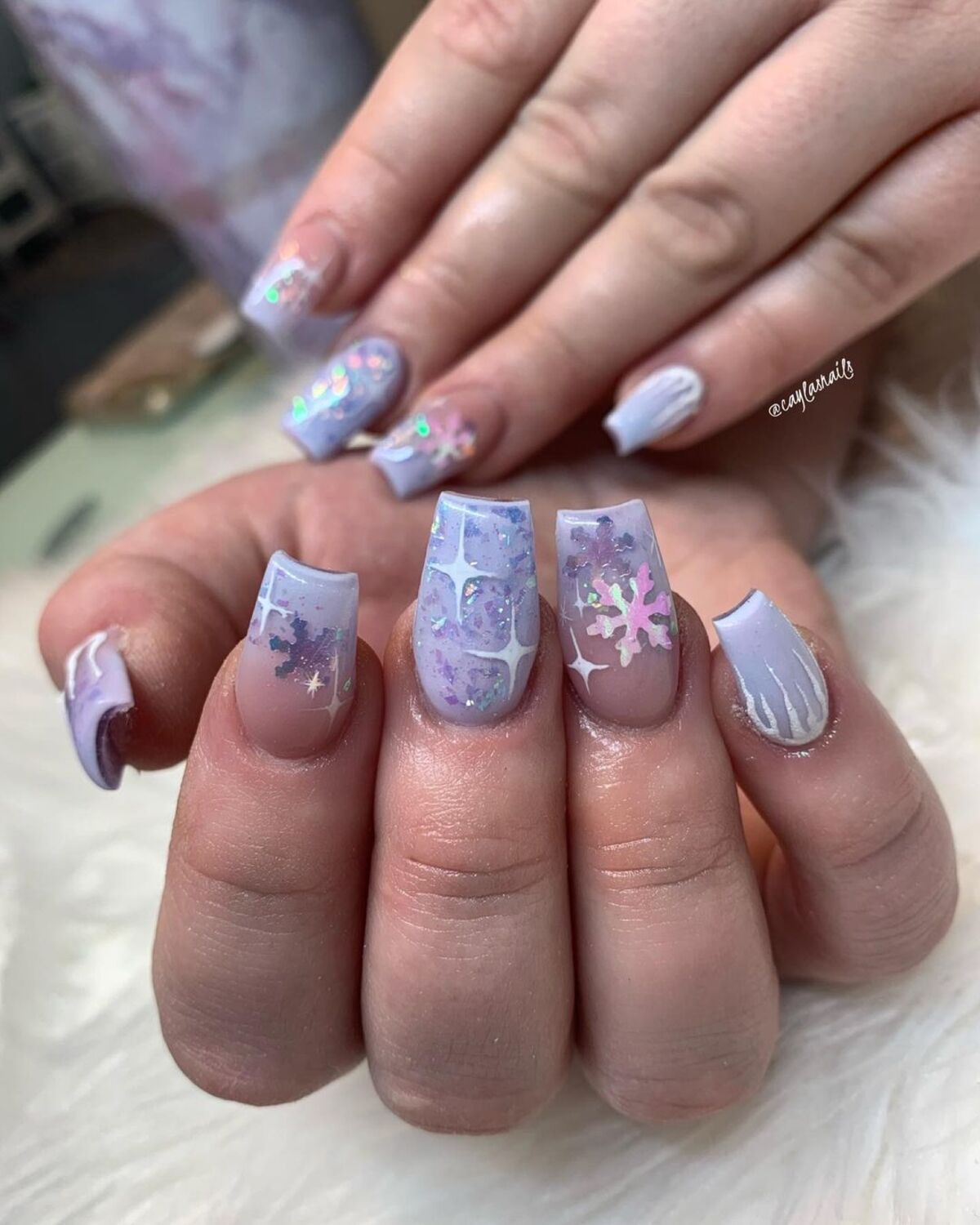 6. Lavender Snowflakes on a Glossy Lilac Base