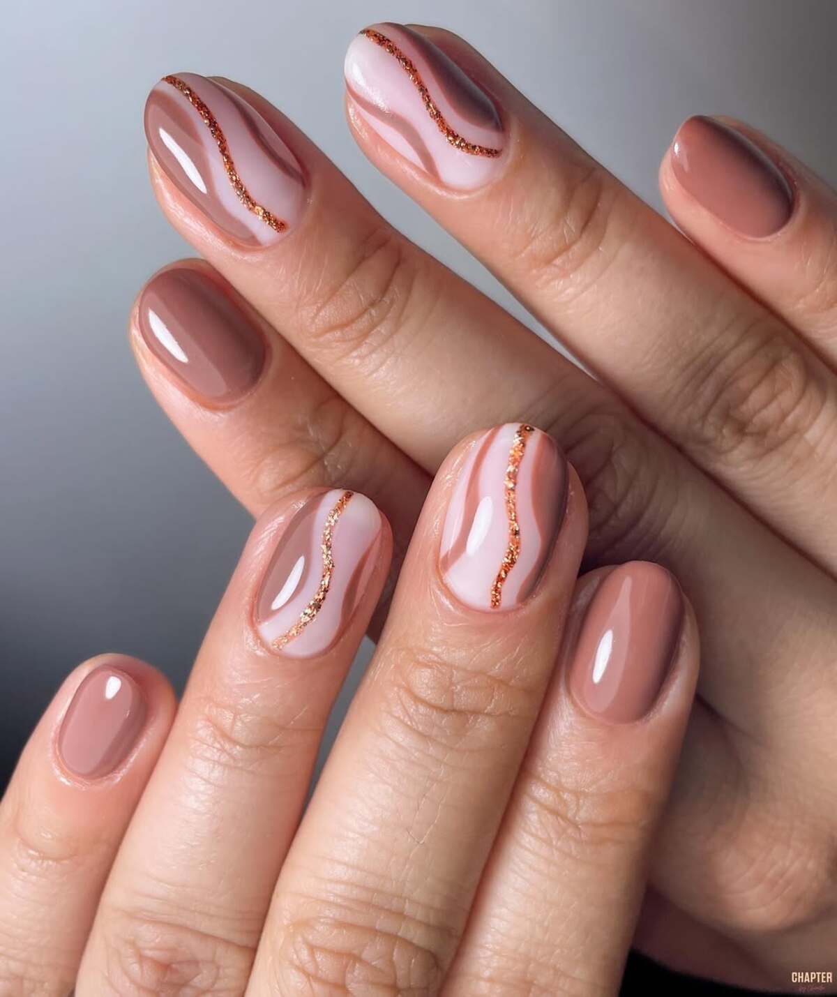 17. Curved Metallic Lines with Warm Nude Shades