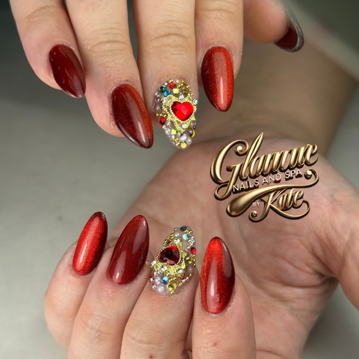 14. Jewel-Embedded Red Glam Nails